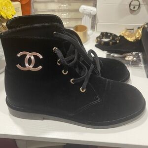 CHANEL Black Leather Interior with Gold Accents